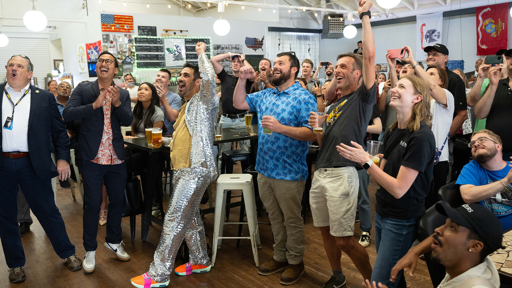 members of the UI TRACERS team celebrating during the launch