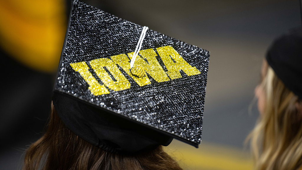 a graduation cap bedazzled with the Iowa logo