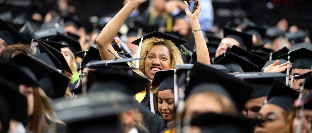 Students celebrating at University of Iowa graduation