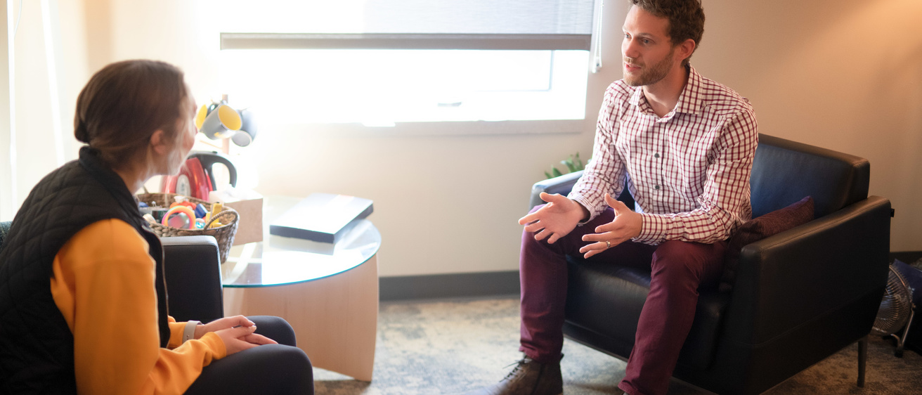 counselor talking with a student