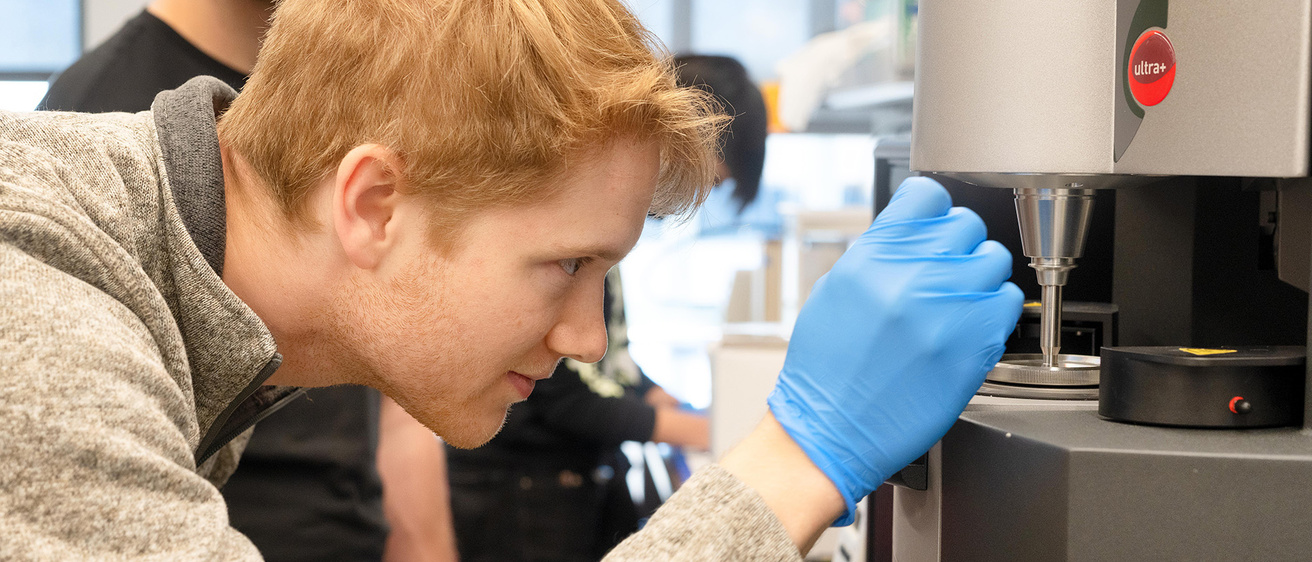 a biomedical engineer works in a lab