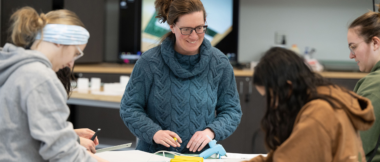 an instructor and students in a medical device design course