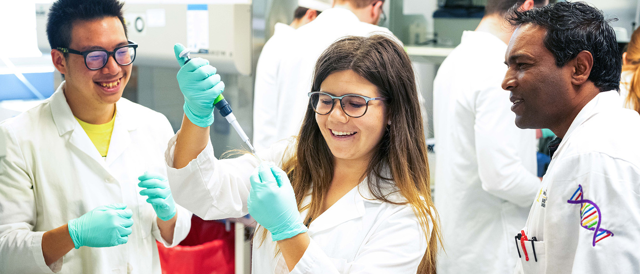 people in a lab for a biomedical engineering cell biology class