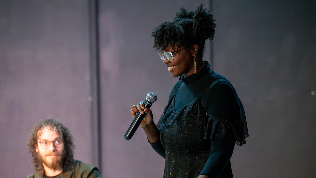 University of Iowa student Cianon Jones speaking at a reading of her play