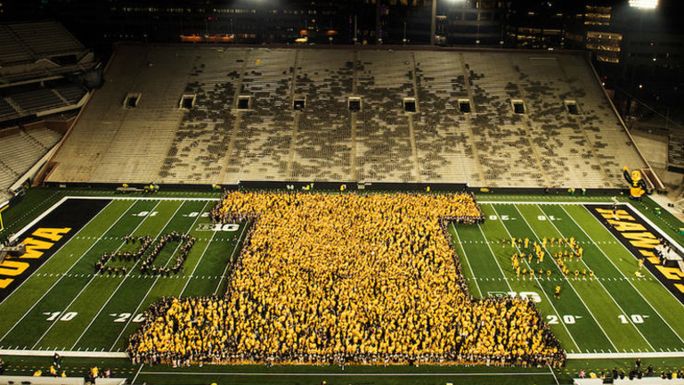 Iowa class of 2022 gathered into shape of giant letter I